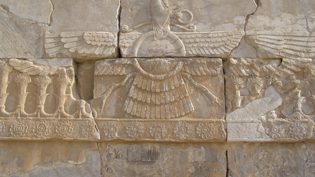 Faravahar — Zoroastrian winged disc symbol carved in stone relief at Persepolis, Achaemenid Empire